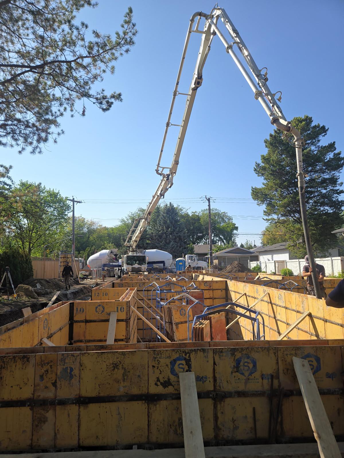 Concrete pump truck on a job site in Edmonton, Alberta – ZBest Concrete Pumping