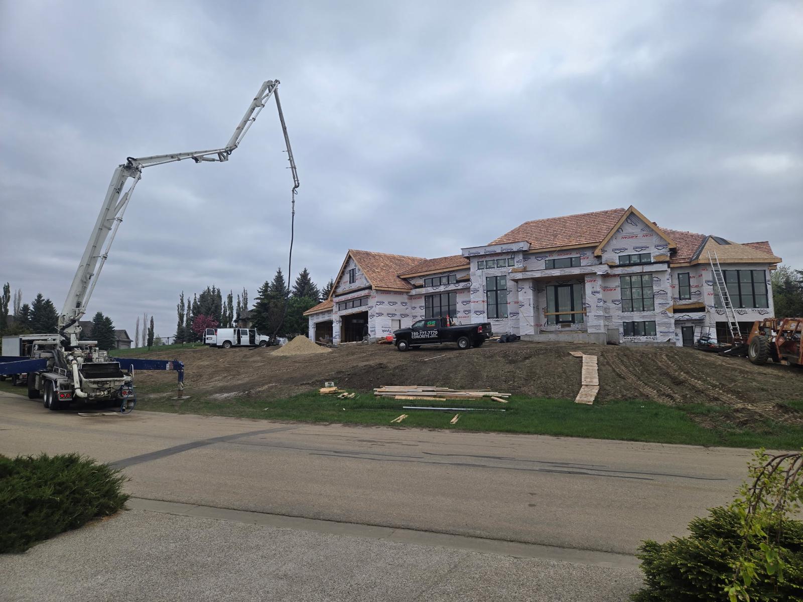 ZBest Concrete Pumping crew and equipment on a job site in Edmonton, Alberta
